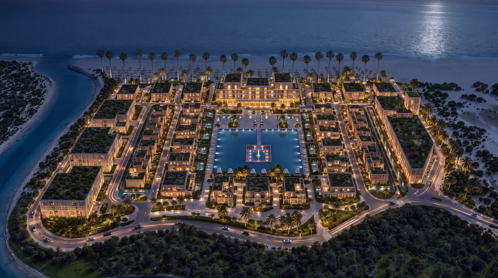 Mira Ocean Estates illuminated at night beside the Arabian Sea in Salalah, Oman