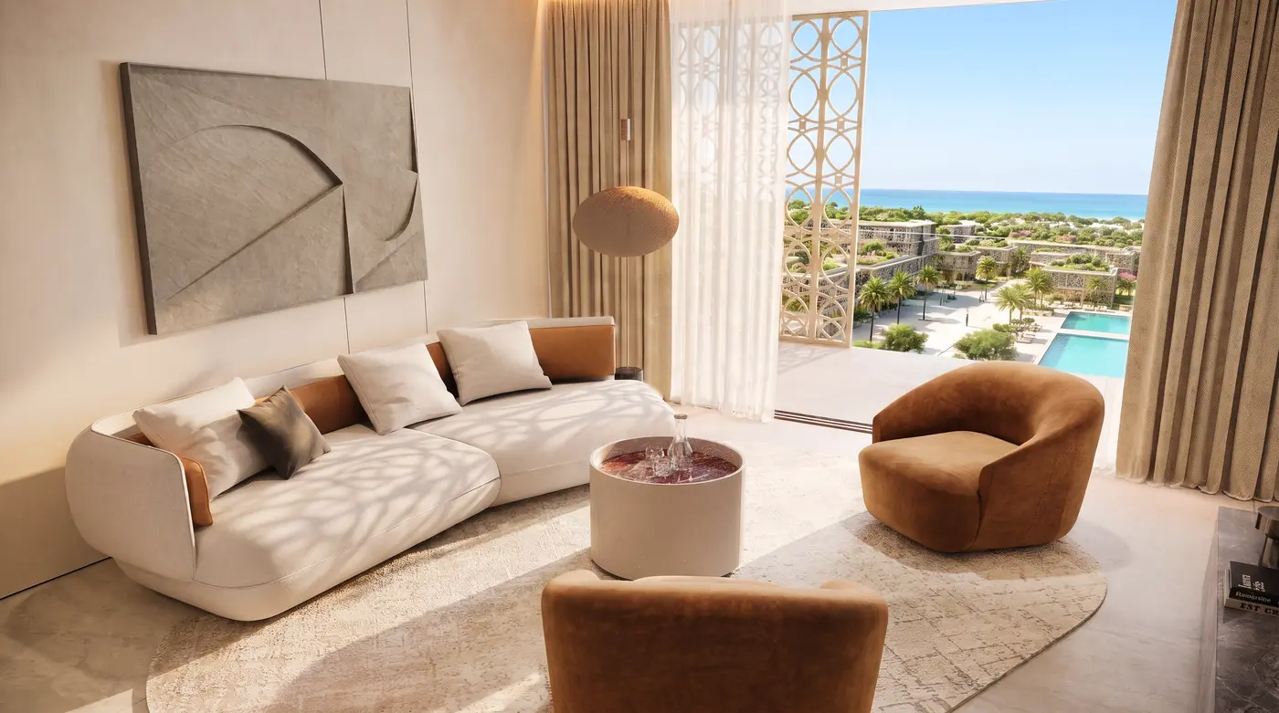 Townhouse lounge at Mira Ocean Estates overlooking the lagoon pool and palm gardens